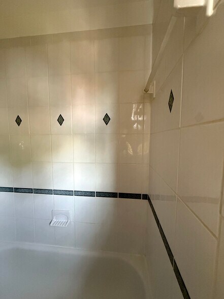 White Bathroom Tile & Grout - 236 Crabapple Ln
