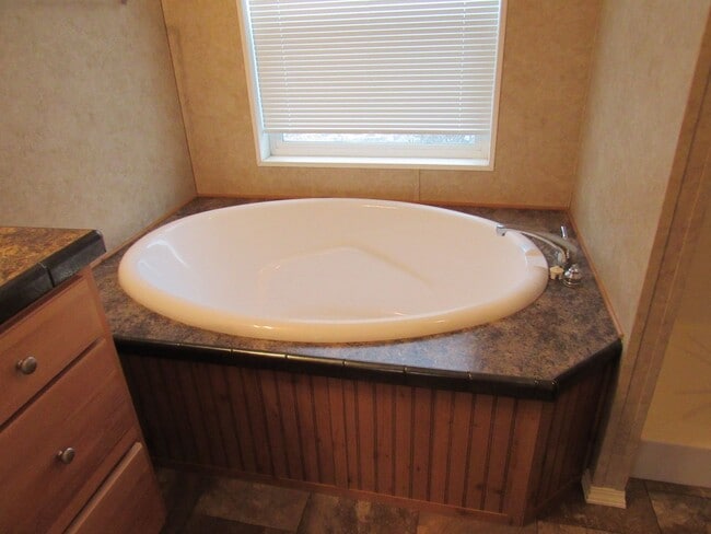 Building Photo - 3 Bed 2 bath Mills Mobile Home on Beautiful Treed Lot