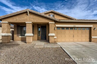 Building Photo - Spacious 4-Bedroom Home in Surprise, AZ! C...