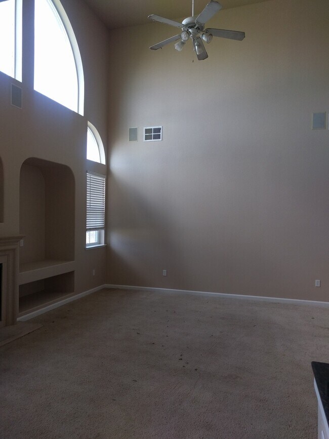 Building Photo - Gated Community Stunner ready to be called...