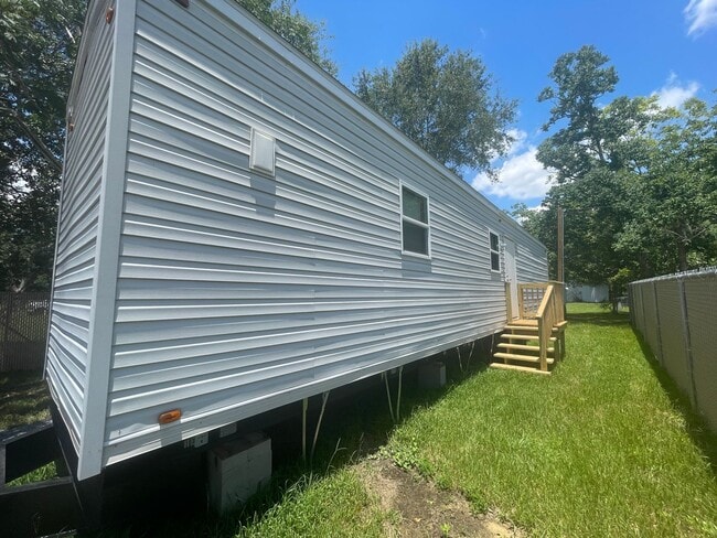 Building Photo - NEW 1 BEDROOM TINY HOME