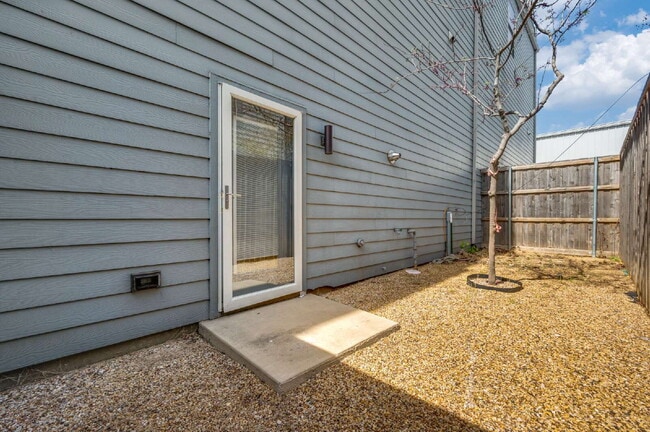 Building Photo - Live Above It All | Sleek Multi-Level Condo with Private Rooftop Deck