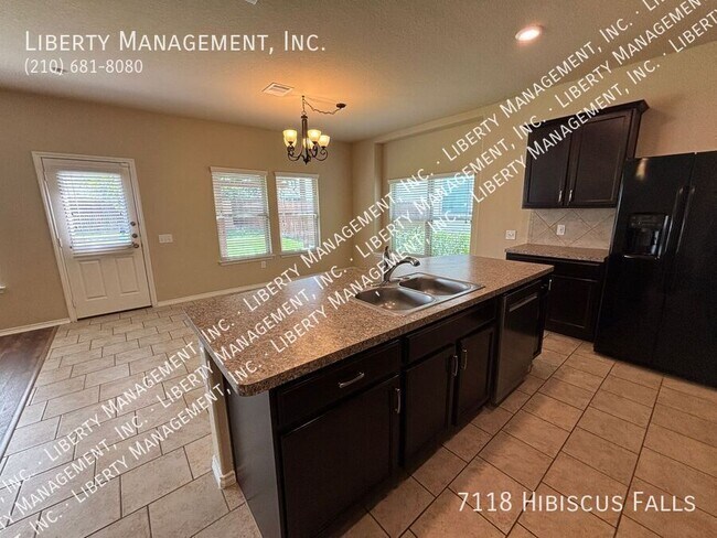 Building Photo - 7118 Hibiscus Falls
