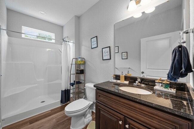 Building Photo - Spacious 6-Bedroom Home with Private Backy...
