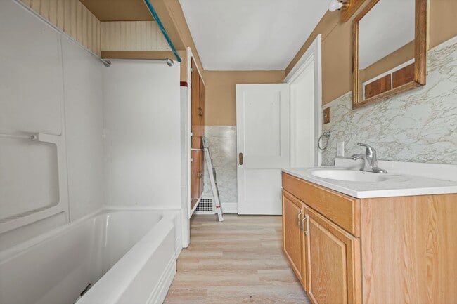 Building Photo - Bright living ? cozy dining flow for everyday comfort and easy entertaining.