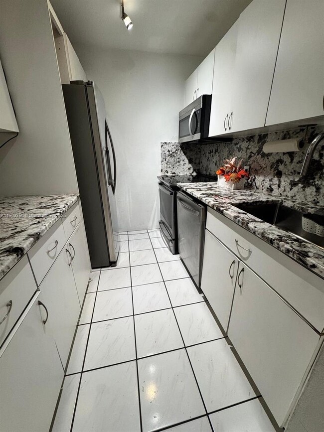 Building Photo - 10500 SW 108th Ave