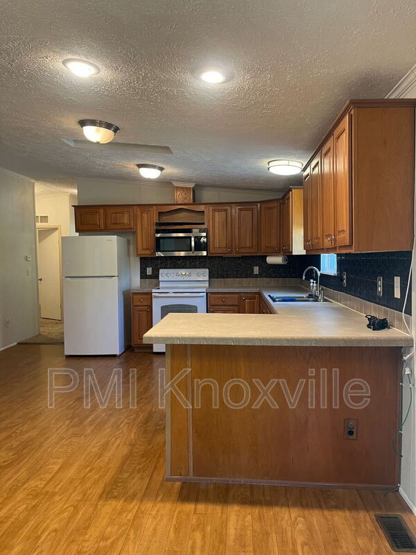 Building Photo - 8821 Trout Rd