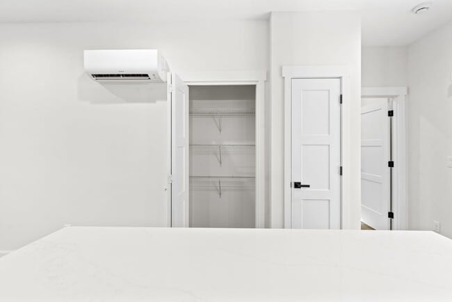 Building Photo - Brand new 2 bed/2 bath, central a/c, dishwasher, washer & dryer, deck & patio! March rent free!