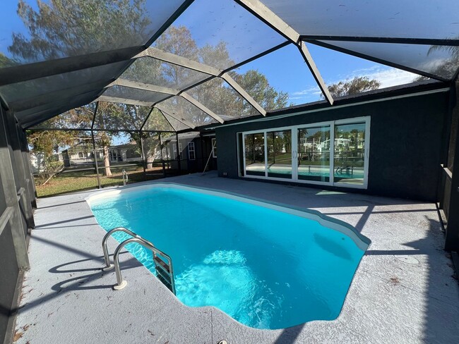 Building Photo - $2,495 ** Annual ** Custom, Renovated Pool...