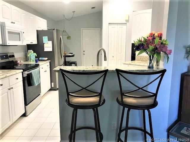 Building Photo - 3486 SW Pindo Palm Ln