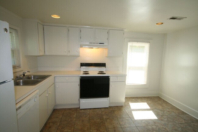 Building Photo - Half a block from Duke East. A bay window you'll love. A backyard that surprises you.