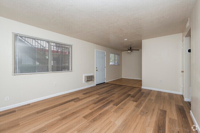 2BR, 1BA - 820SF - Living Room and Dining - Borderman's Reef