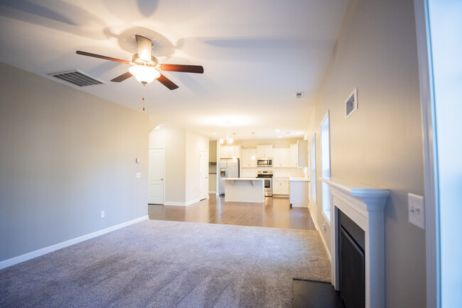 Living Room into Kitchen - 23 Okame Ct