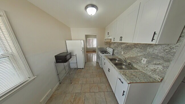 Building Photo - 8059 Prospect Ave