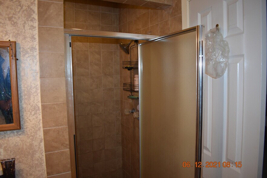 Attached standing shower for master bedroom - 2205 Cedar St