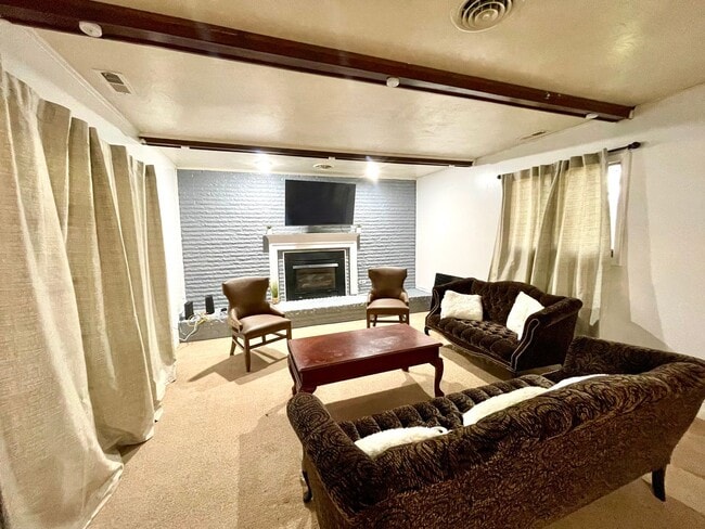 Building Photo - Spacious Home with Large Yard, Hot Tub, and More