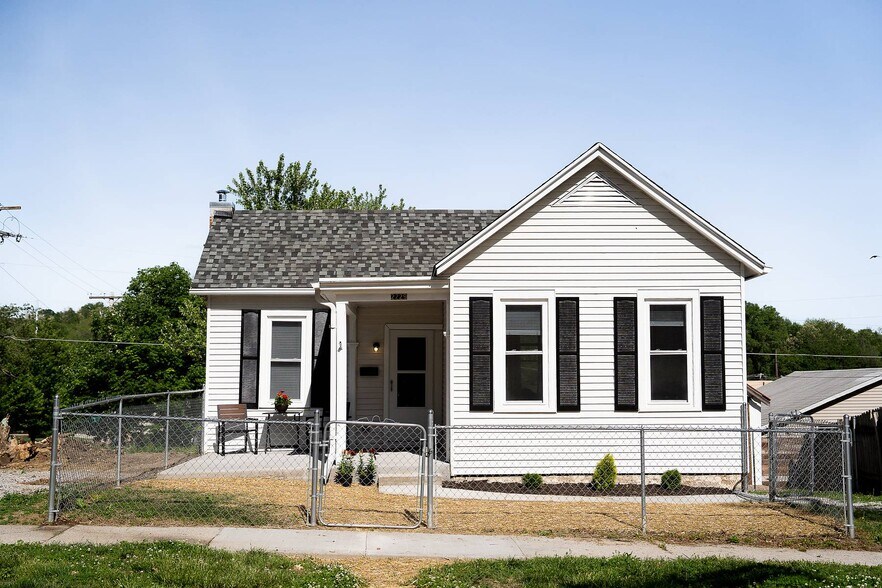 all fenced front and backyard with new shrubs - 2229 N 7th St