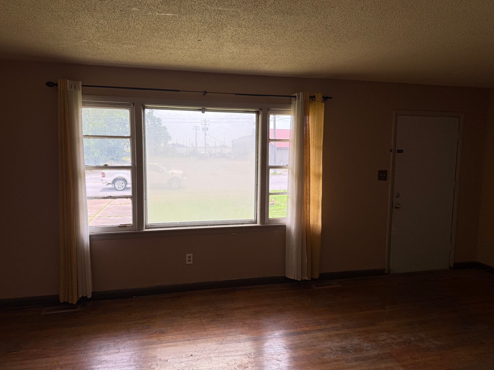 Looking out front window to street - 2410 Forest Home Rd