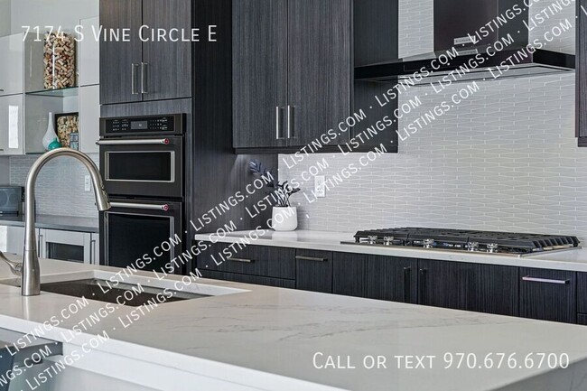 Building Photo - 7174 S Vine Cir E