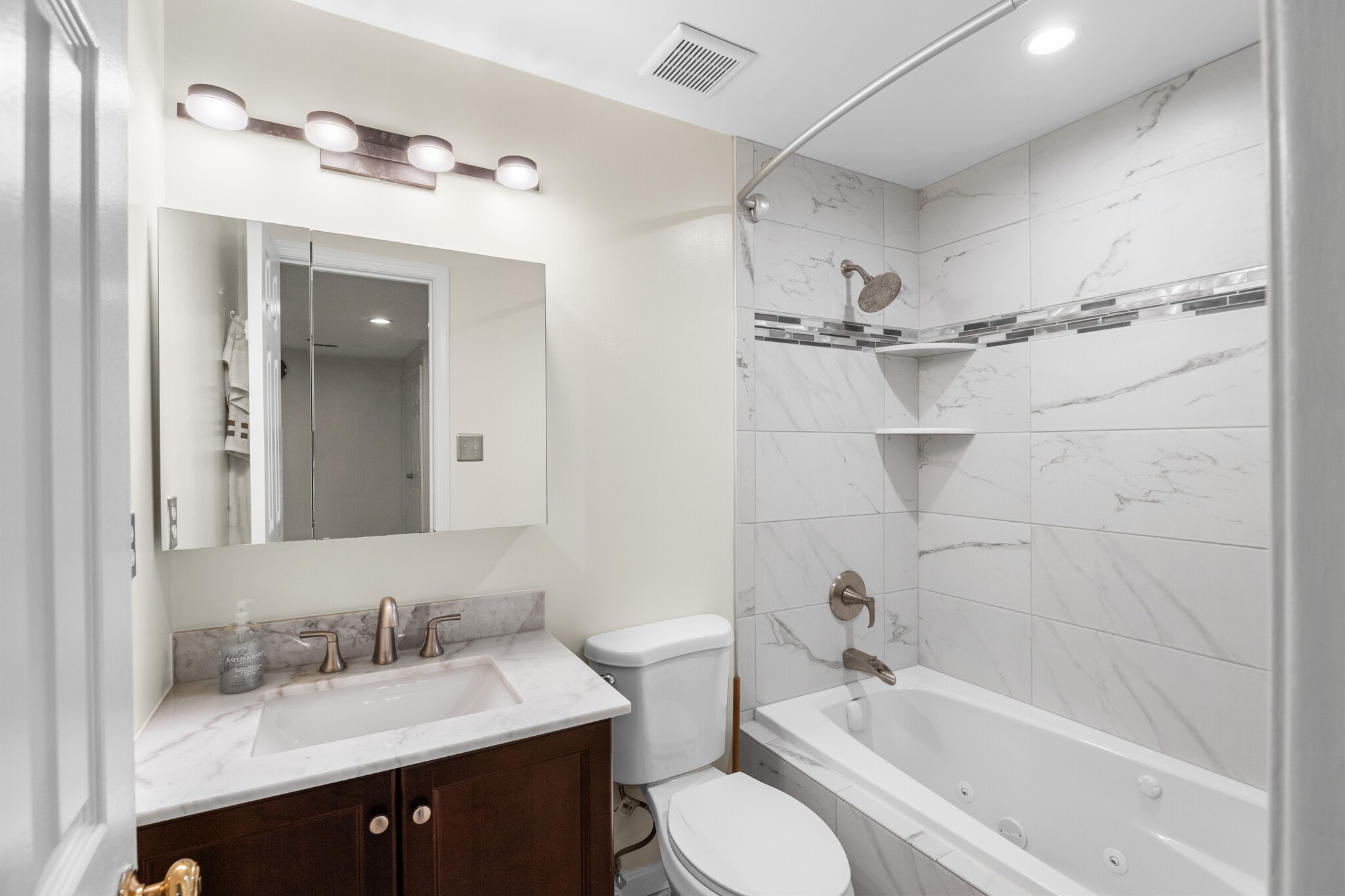 lower level full bath - 8063 Dulciana Ct