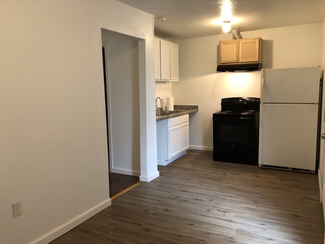 Kitchen with full size refrigerator - 116 Frawley St