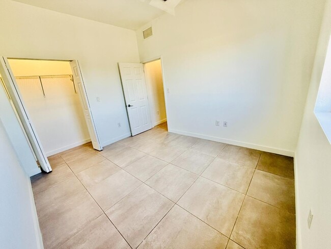 Building Photo - 1295 W 69th St