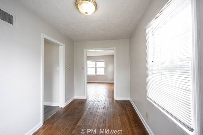 Building Photo - "Charming 2-Bedroom Duplex with Gleaming Hardwood Floors in Indy!"