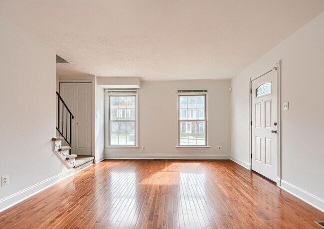 Building Photo - Updated End-of-Group Townhome with Finished Lower Level, Fenced Yard & Community Pool