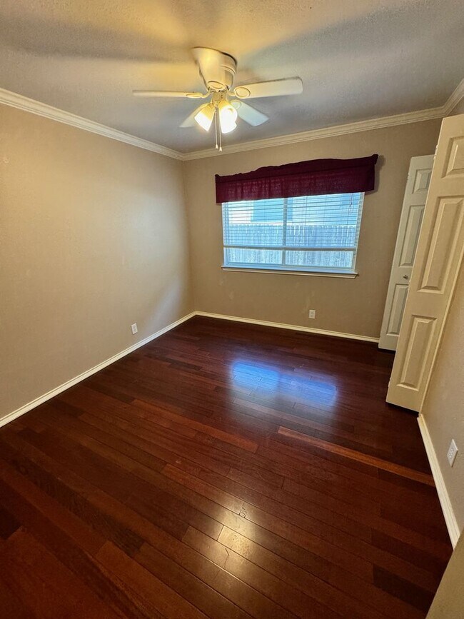 Building Photo - Ready For Move In! A Must See in Rogers Ranch - 4 Bedroom 2 Bath with Custom Features