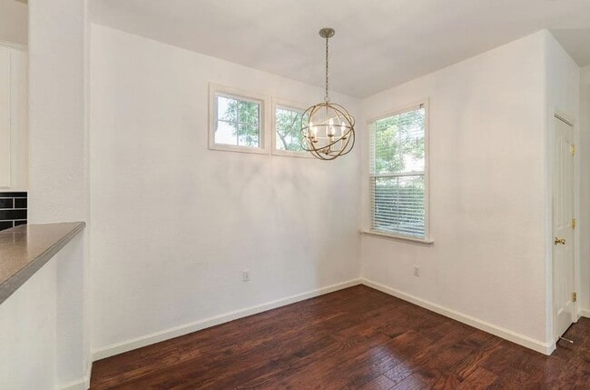 Building Photo - Experience Esplanade! Premier Townhome Com...