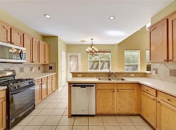 Building Photo - 8003 Magic Mountain Cove