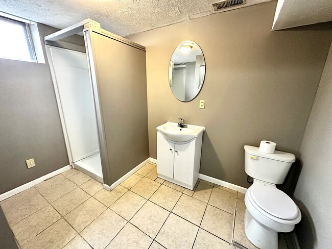 Building Photo - Spacious 3 Bed Home with Finished Basement & Hardwood Floors