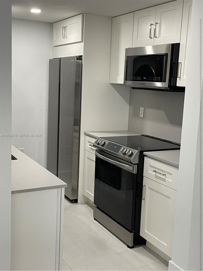 Building Photo - 10275 Collins Ave