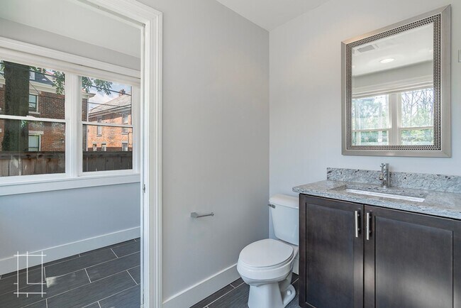 Building Photo - Available Now: One Month Free Rent!