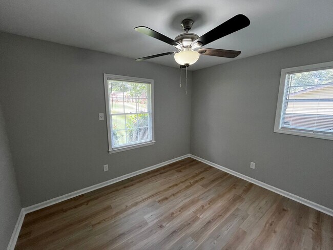 Building Photo - Must See the Sunroom off the Primary Bedroom!