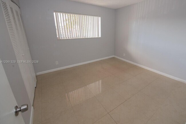 Building Photo - 8550 N Sherman Cir