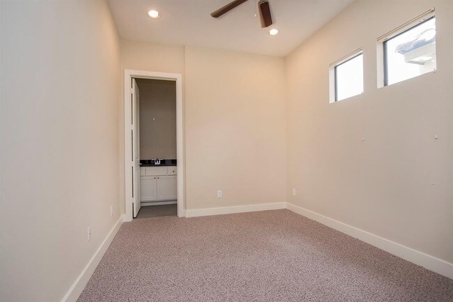 Building Photo - Contemporary townhome, rooftop terrace awa...