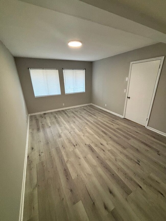 Building Photo - RENOVATED!! Condo includes Water & Trash P...
