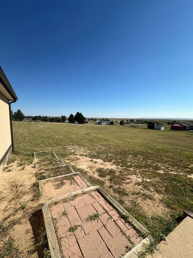 Building Photo - MODERN UPGRADES AND RURAL LIVING IN PEYTON