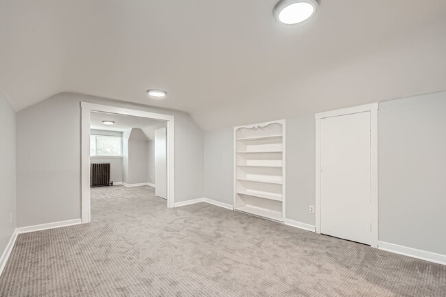 Building Photo - 7449 S Vernon Ave