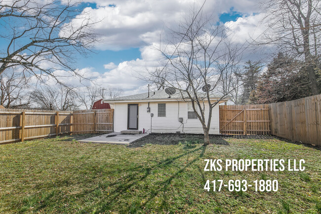 Back Yard with Concrete Patio - 2903 W Olive St