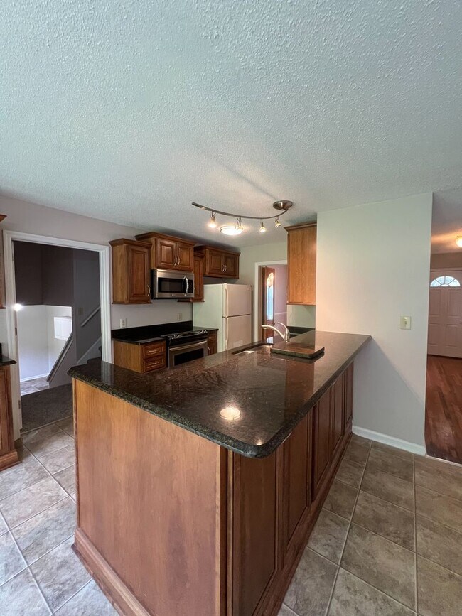 Building Photo - Gorgeous Single-Family Home! Large Deck, B...