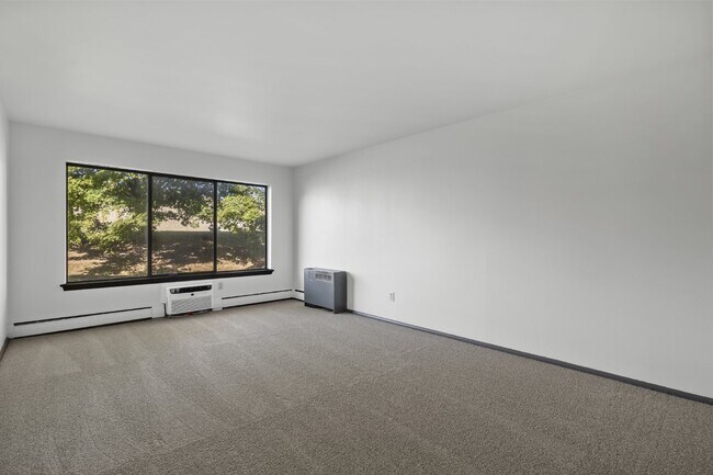 Building Photo - Large, updated, two bedroom available February first