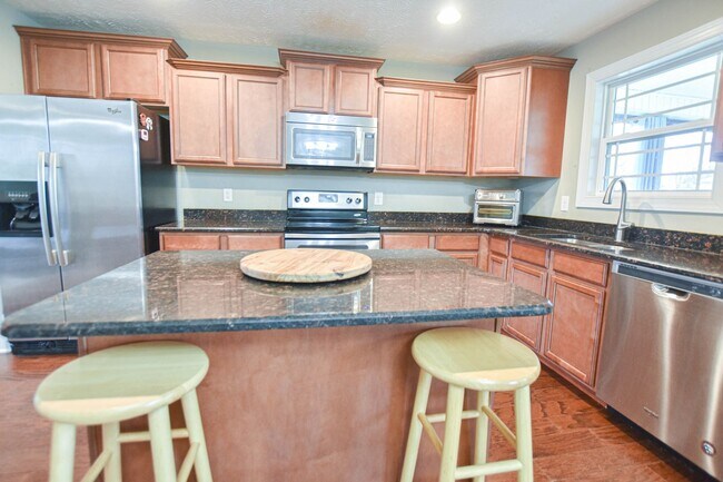 Building Photo - Pet Friendly Four Bedroom with Basement in...