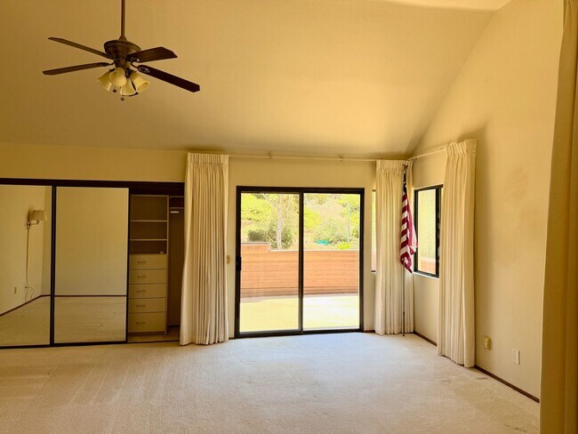 Building Photo - Private Oasis with Sunroom, Balcony & Lush Landscaping | 4BR Home Near Community Pool & Spa