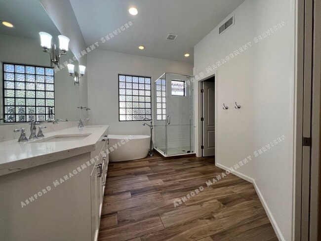 Building Photo - COME HOME TO LUXURY IN GATED GRAYHAWK GOLF...