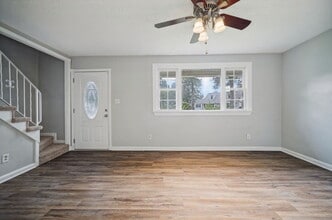 Building Photo - RARE FIND-4 BEDROOMS, 2 BATHROOMS, FENCED BACK YARD and GARAGE-PETS!!