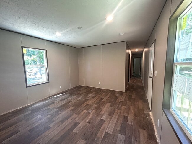 Building Photo - Brand new 4BR Mobile Home - Country living with City convenience!