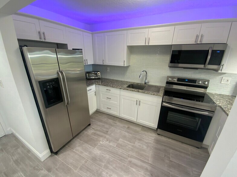 Building Photo - 6444 Collins Ave