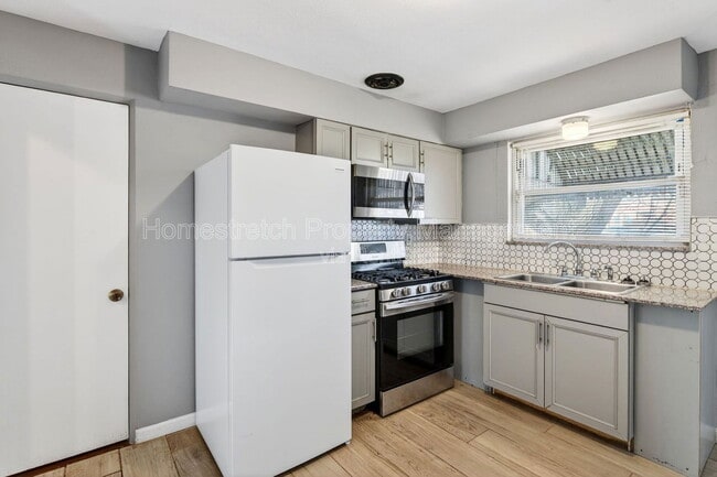 Building Photo - 4036 Dunnica Ave